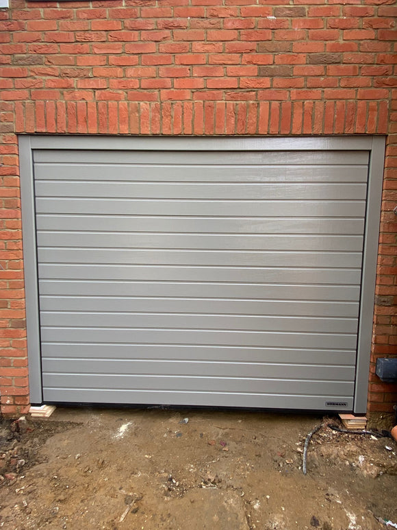 Hormann LPU 42 S-Ribbed Woodgrain Sectional Garage Door