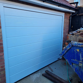 Hormann LPU 42 M-Ribbed Woodgrain Sectional Door - 0